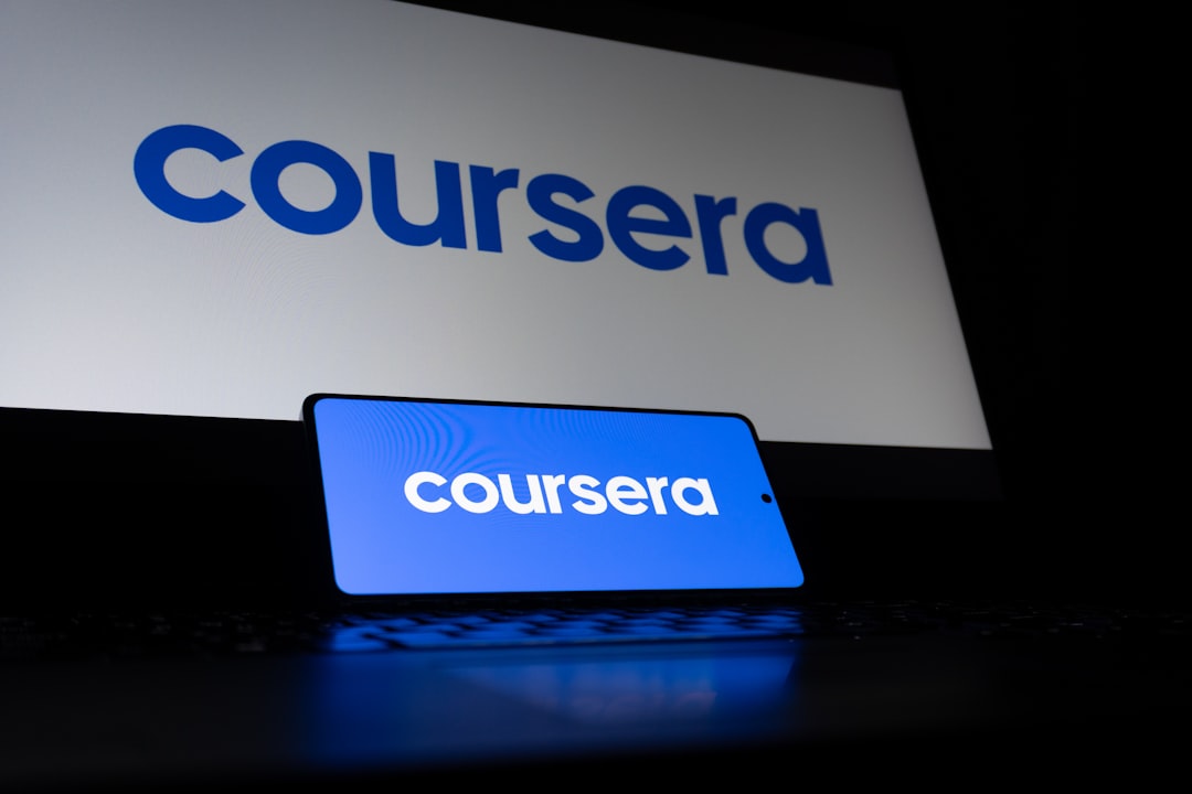 coursera-logo-displayed-on-a-laptop-and-phone-screen-lpnlet5fjgm